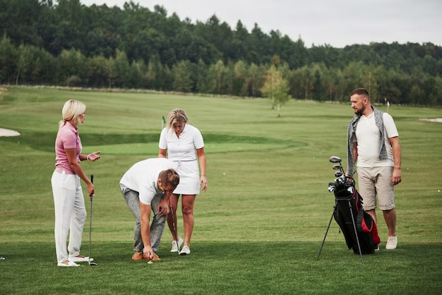 People playing golf on the course